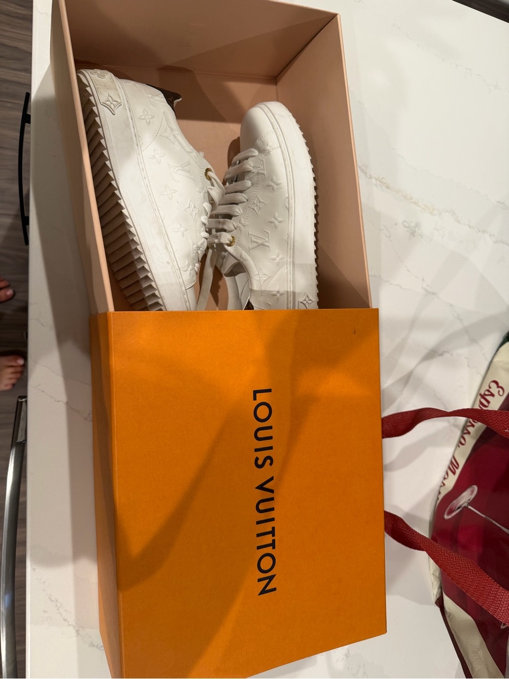 Louis Vuitton Cream Embossed Monogram Low-Top Sneakers
